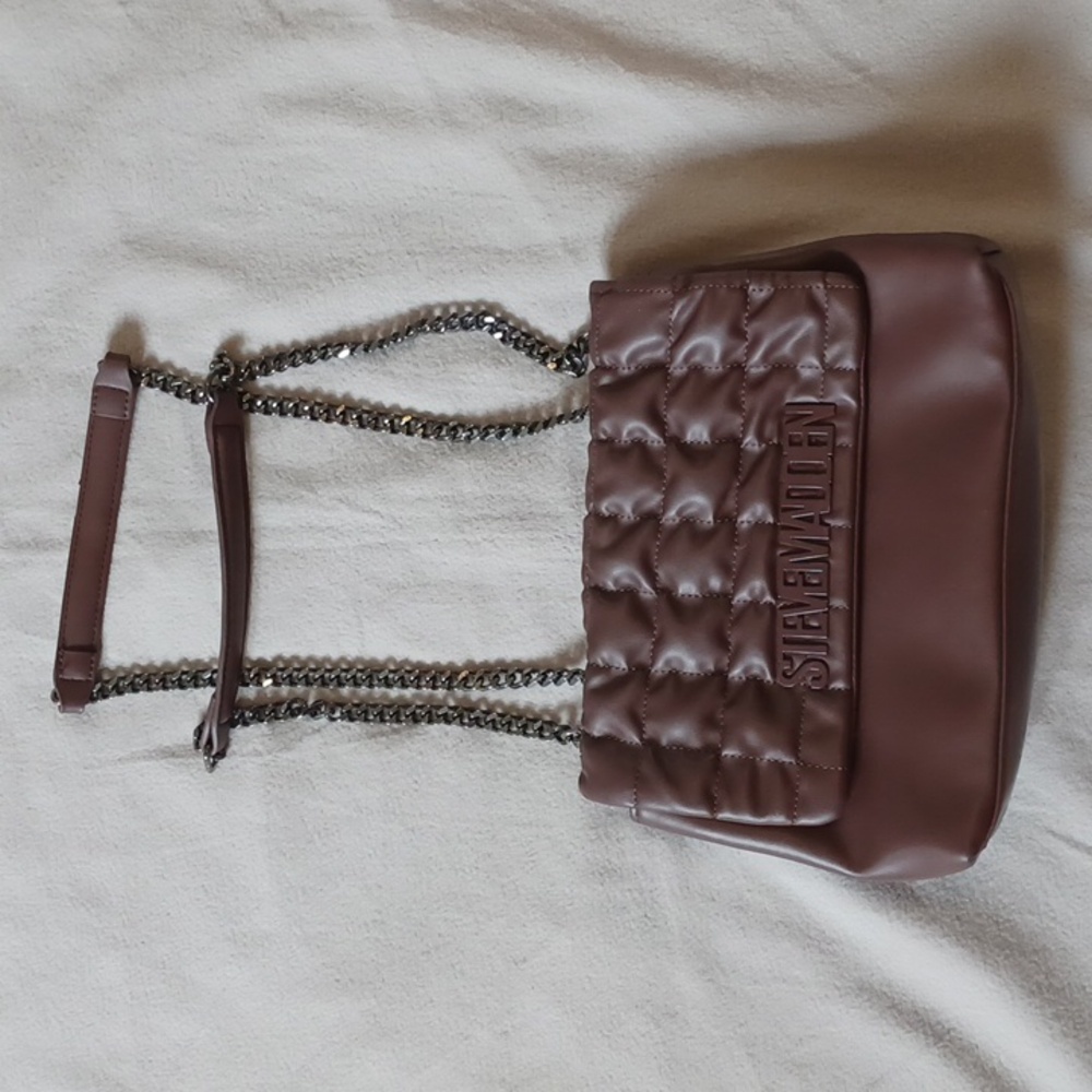 Steve Madden  quilted crossbody bag with a chain strap in a brown/cognac